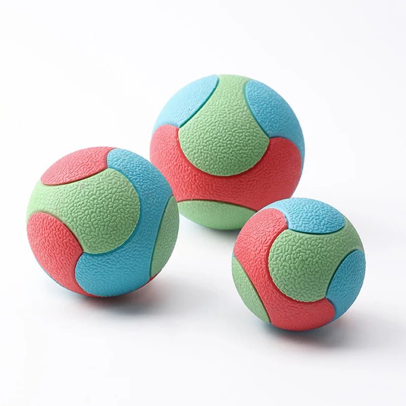 Close-up of textured chew toy, a rubber bouncy ball for dog dental care and play