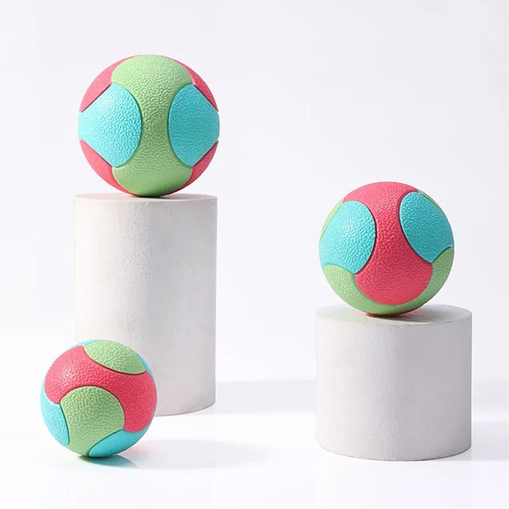 Green fetch toy, a sturdy rubber bouncy ball for dogs' dental health and exercise
