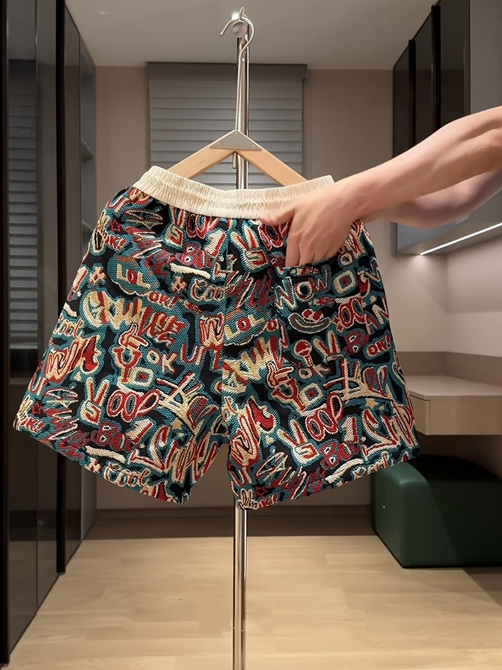 Vibrant men's graffiti shorts, relaxed fit with drawstring waist. Ideal for comfortable urban streetwear.