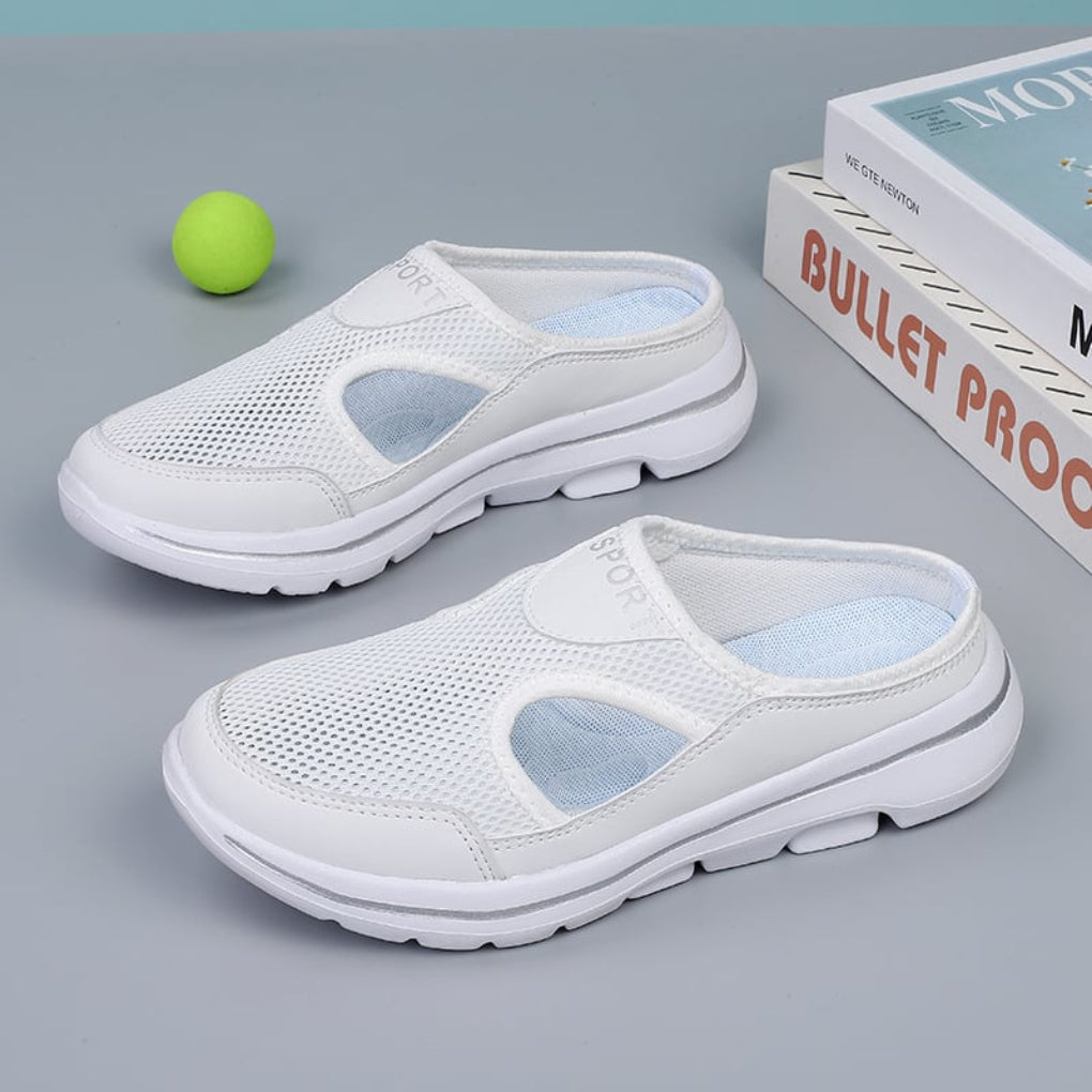 Soft orthopedic house slippers, offering superior comfort and arch support for everyday home wear.