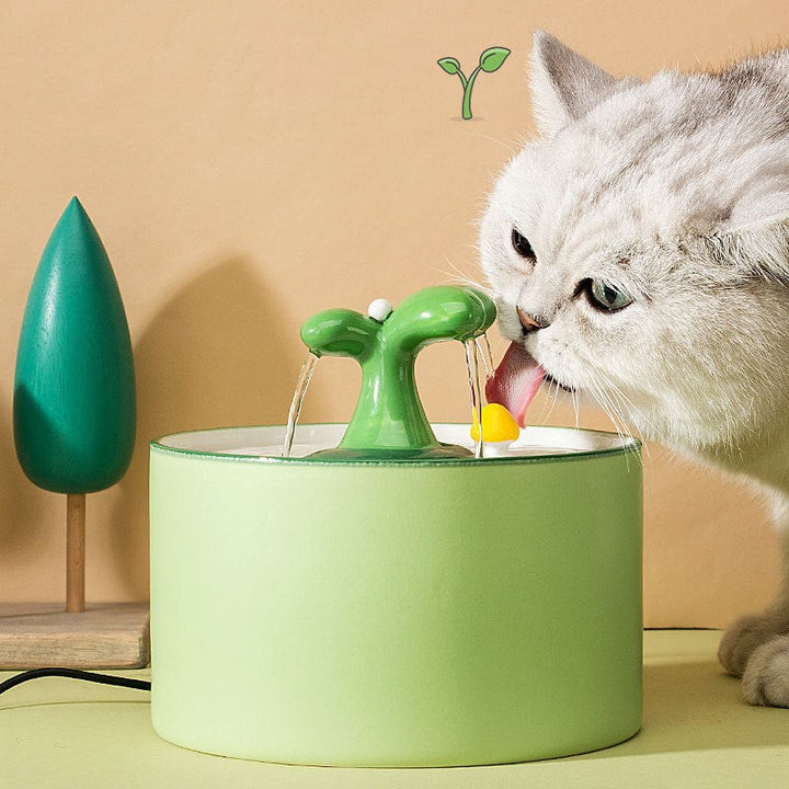 Detailed view of a pet ceramic water fountain with a visible water level indicator, easy to monitor.