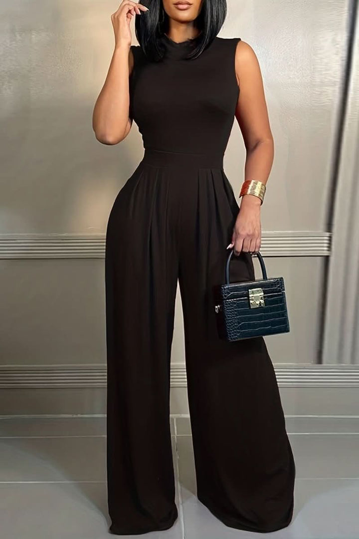 Chic sleeveless floral jumpsuit for women. Perfect spring fashion, sophisticated style & vacation attire. Elegant one-piece.