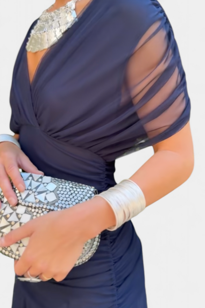 Off-shoulder draped maxi dress for women, elegant & formal. A stunning fit-and-flare party gown.