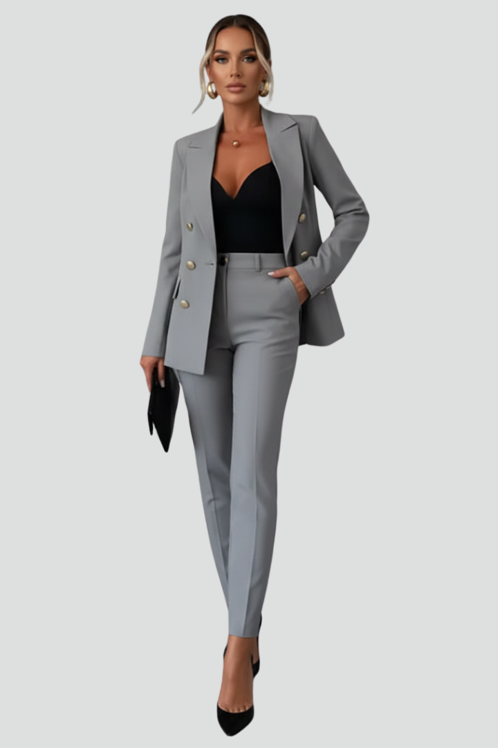 Detail of a women's elegant blazer, part of a straight trousers suit set. Perfect for business fashion & work outfits.