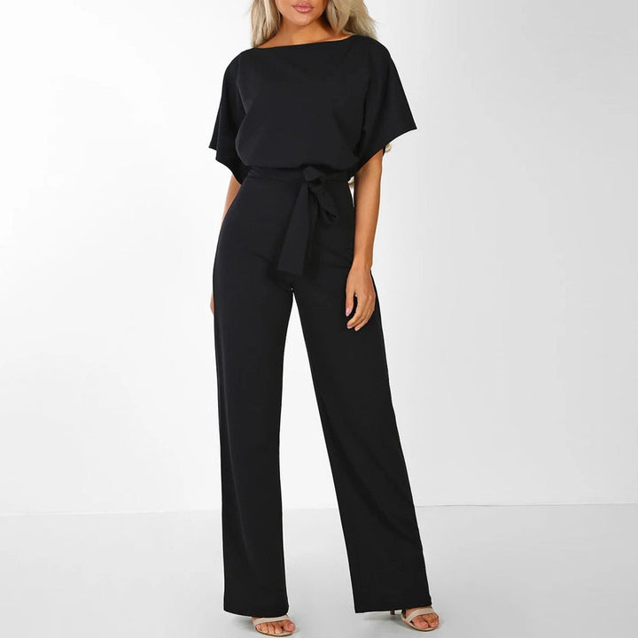 Chic women's one-piece jumpsuit, wide leg & belted, ideal for casual wear or party.