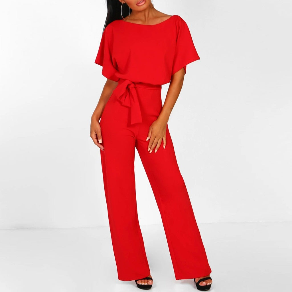 Sophisticated women's wide leg jumpsuit with boat neck, short sleeves & chic belt. Elegant summer wear.