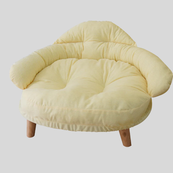 Stylish elevated pet bed made from wood, featuring a plush cushion for pet comfort. Suitable for all seasons.