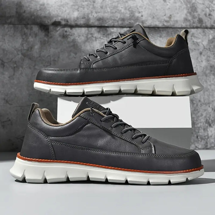Mens comfortable everyday sneakers. Stylish casual walking shoes offering all-day support and versatile appeal.