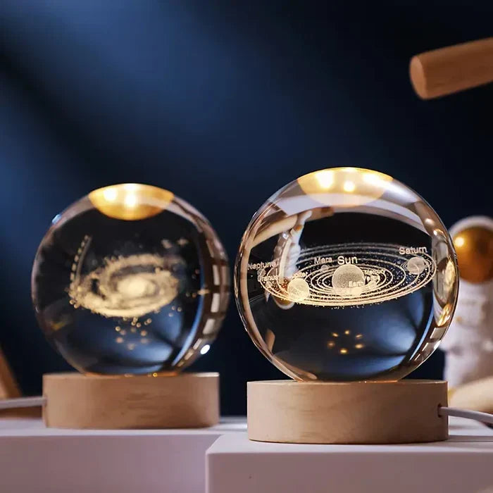 Glowing sphere night light in elegant gift box, a unique celestial lamp present for any space enthusiast.