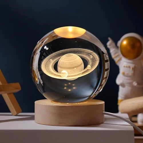 Versatile celestial glowing sphere night light, 3D engraved galaxy, ideal desk lamp & home decor accent.