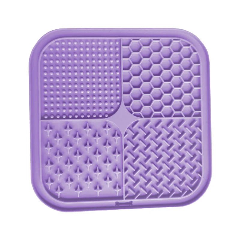 Green silicone lick mat for dogs and cats, promoting slow feeding and enrichment.