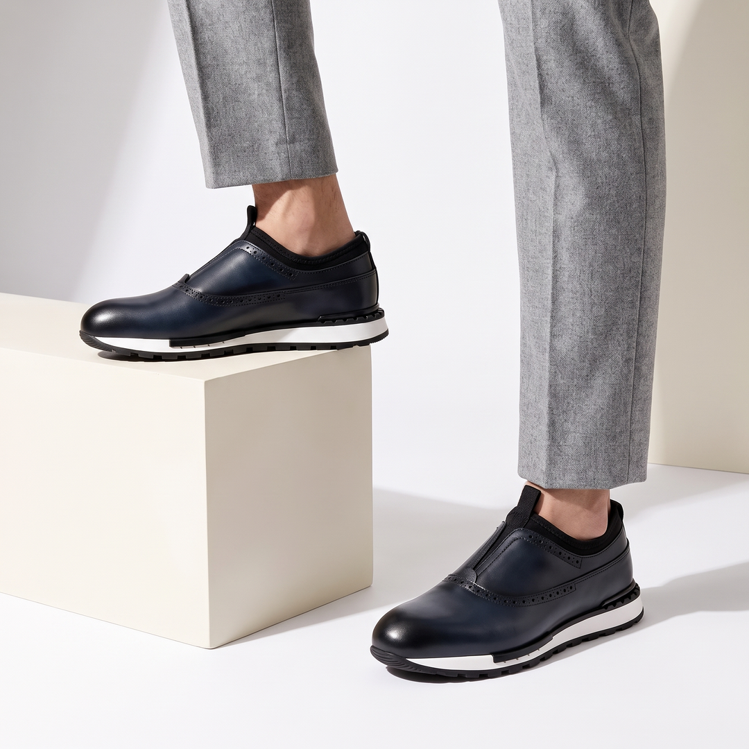 Stylish blue men's slip-on loafers, offering comfort and a smart casual dress shoe look.