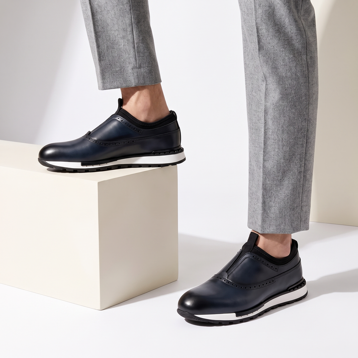 Stylish blue men's slip-on loafers, offering comfort and a smart casual dress shoe look.