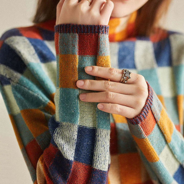 Cozy women's patchwork turtleneck sweater. Stylish long sleeve pullover ideal for autumn & winter fashion.