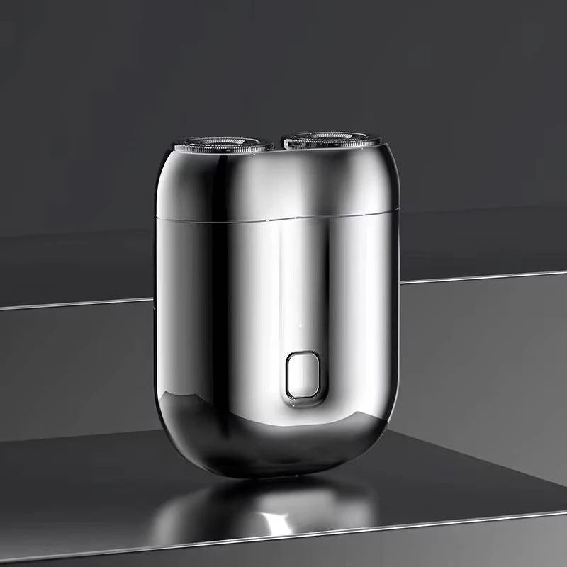 Men's portable electric shaver with magnetic head for fast, quiet wet/dry shave. Rechargeable travel razor.
