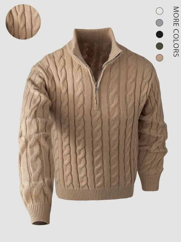 Close-up of the intricate cable knit pattern on a warm men's quarter-zip sweater, highlighting texture and quality.