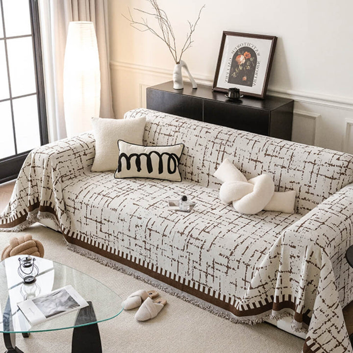 Multifunctional chenille throw protecting sofa from scratches, perfect for living rooms
