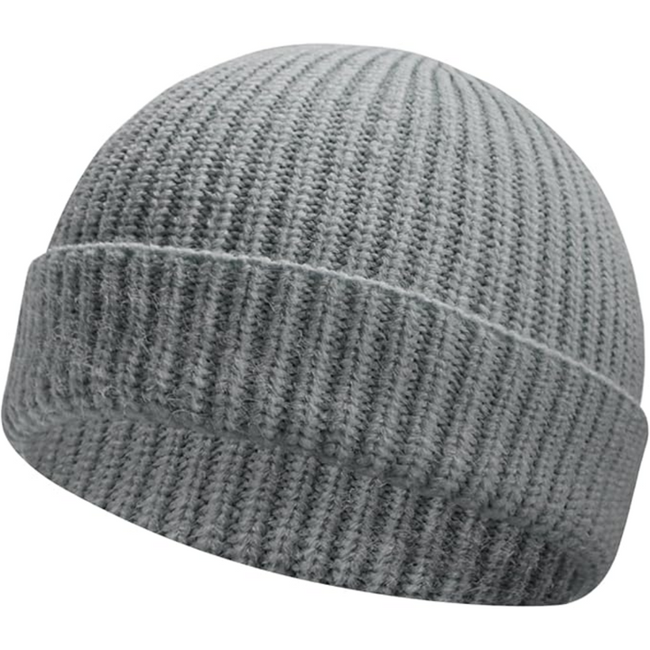 Trendy unisex winter hat, a durable knitted beanie for cold weather protection & style.