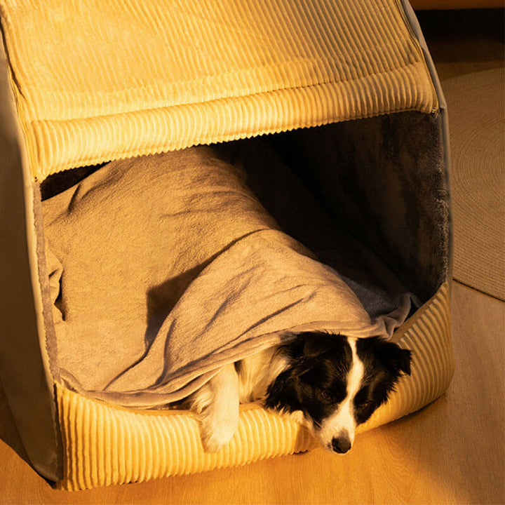 Gray large dog bed with soft flannel lining, offering a cozy den experience for your pet. Washable.