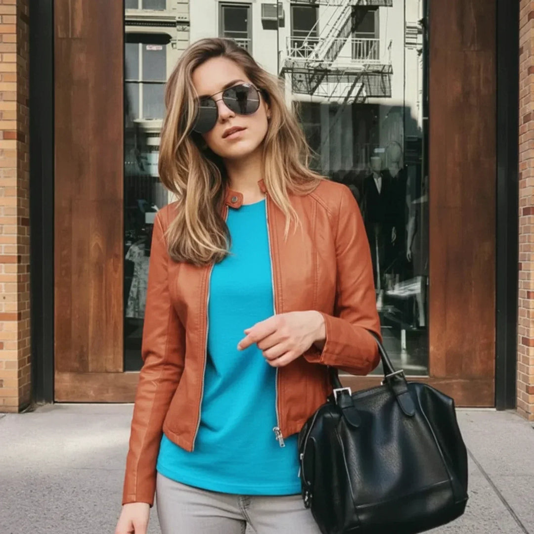 Sleek women's fitted zip-up jacket with a modern design, excellent chic outerwear for any casual or smart casual occasion.