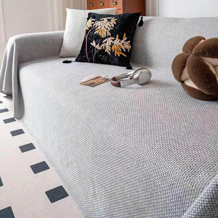 Detail of the durable, scratch-resistant material of the pet-friendly sofa throw cover