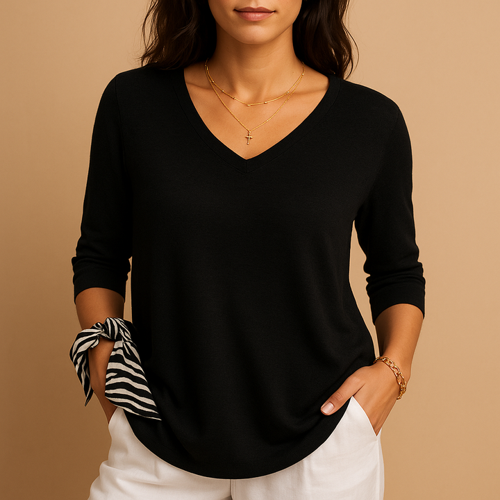 Relaxed fit long sleeve women's tunic top, comfortable and elegant everyday blouse for daily casual wear.