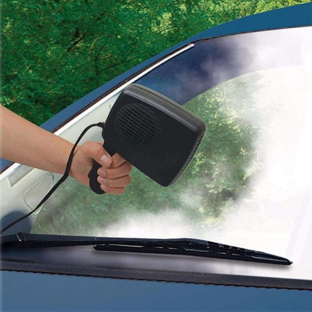 Portable 12V car heater defroster mounted on a dashboard, providing warmth and clear visibility for winter.