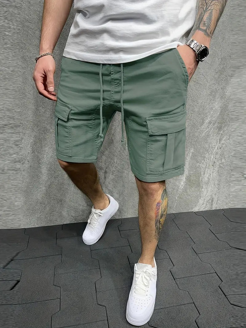 Close-up: Men's utility cargo shorts feature drawstring waist & practical side pockets.