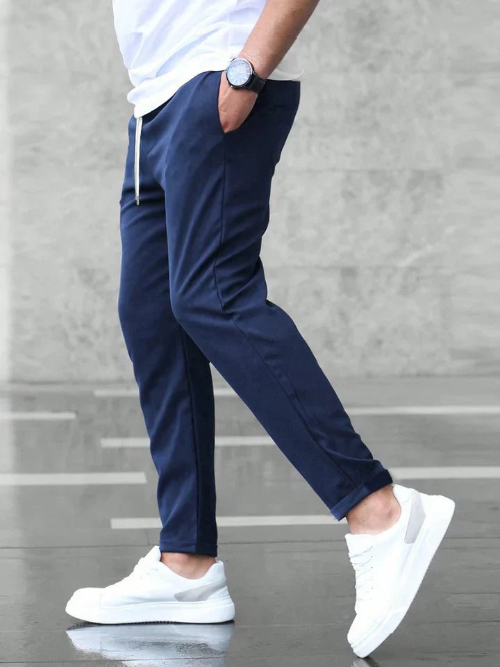 Men's everyday slim fit chino pants with a drawstring, combining comfort and casual style.