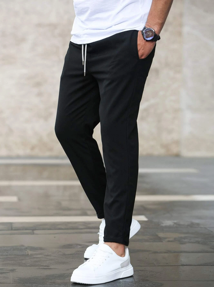 Men's luxury pants with an elastic drawstring waist, ensuring a perfect comfortable fit.