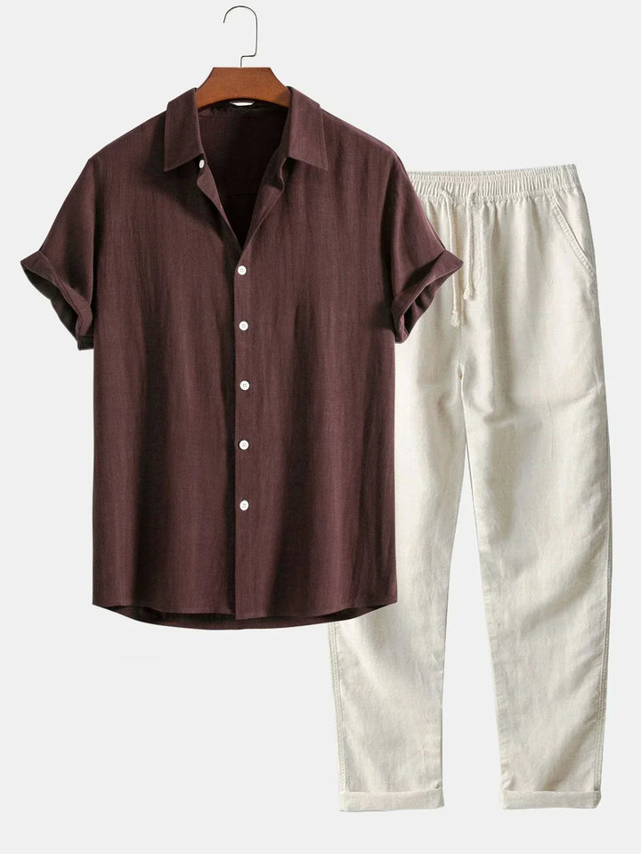 Men's summer fashion casual outfit set with short sleeve shirt & relaxed fit pants, perfect for vacation.