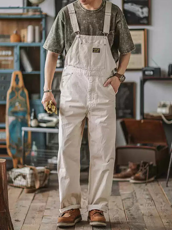 Dark green men's relaxed fit jumpsuit, ideal for casual wear, men's fashion, and workwear style.