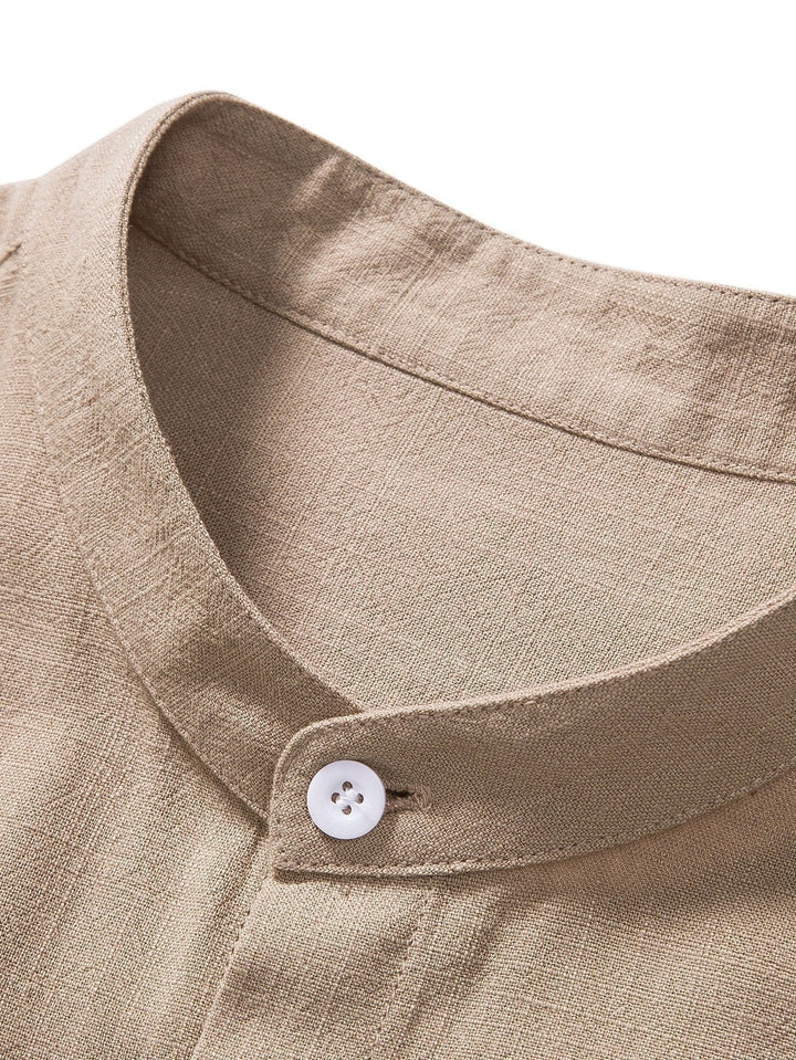 Coordinated men's shirt & pants set, featuring a rolled cuff shirt for a relaxed summer look.