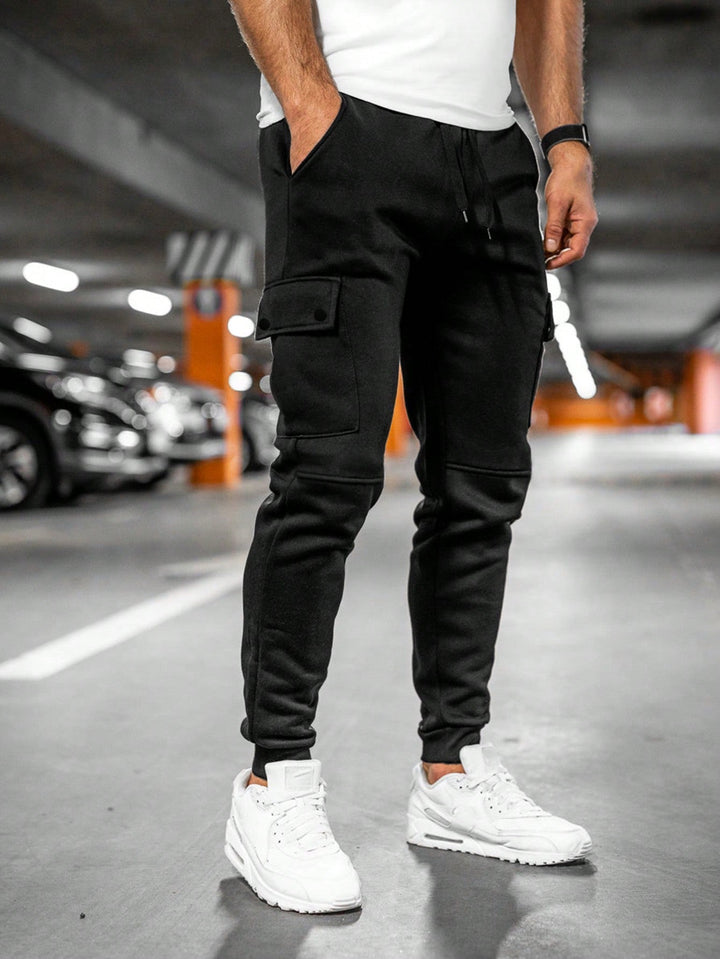 Men's urban casual cargo joggers, black, slim-fit, perfect for comfortable streetwear.