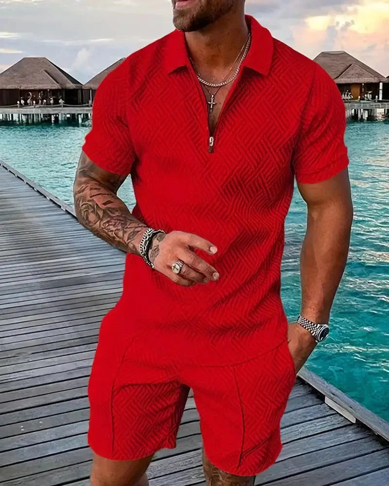 Coordinated men's summer tracksuit set, featuring a stylish zip-up polo and comfortable shorts for daily wear.