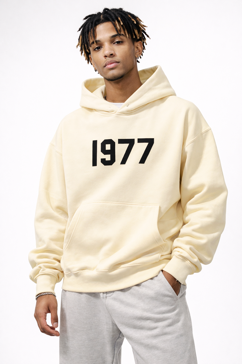 Men's vintage 1977 pullover hoodie. Raglan sleeves, streetwear style, comfortable hooded sweatshirt.