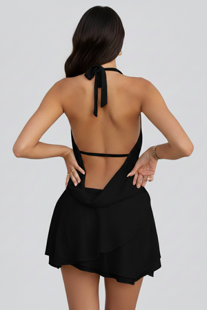 Sultry women's V-neck backless mini dress, great for special nights. Elegant, chic party & cocktail dress style.