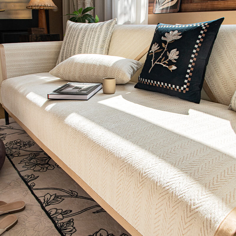 Pet-friendly chenille sofa cover with non-slip backing, enhancing both decor and protection.