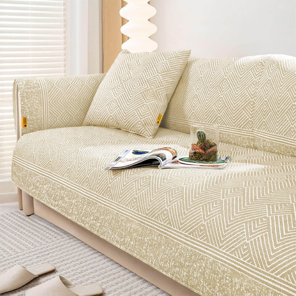 Close-up of ice silk cooling fabric texture on modern sectional couch cover, non-slip.