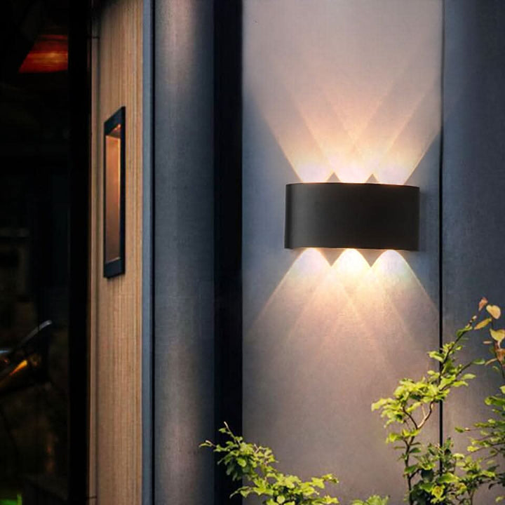 Modern LED outdoor wall light, energy-efficient for contemporary home exterior & garden.
