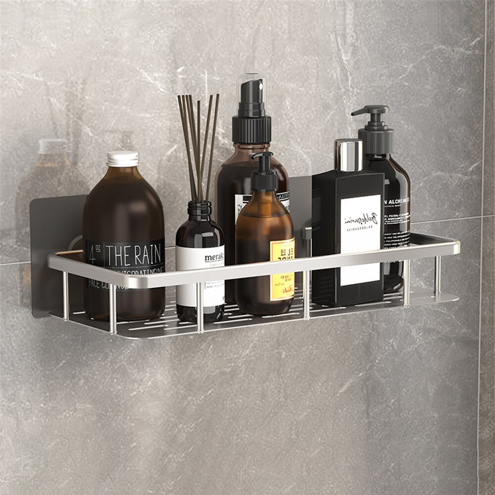 Durable metal wall shelf for bathroom, uses strong suction cups for no-drill installation.