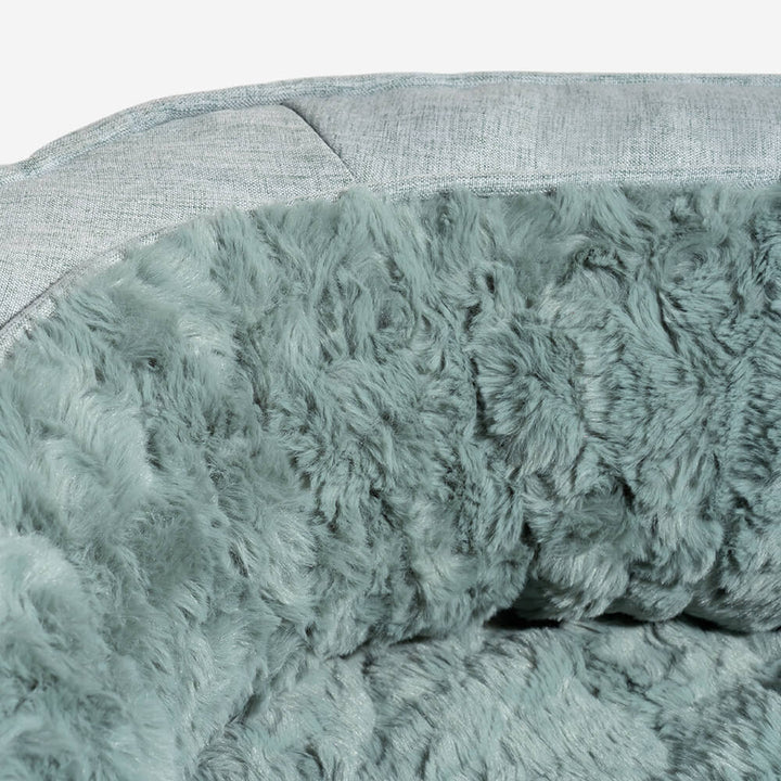 Waterproof donut pet bed, an orthopedic solution for comfort and durability.