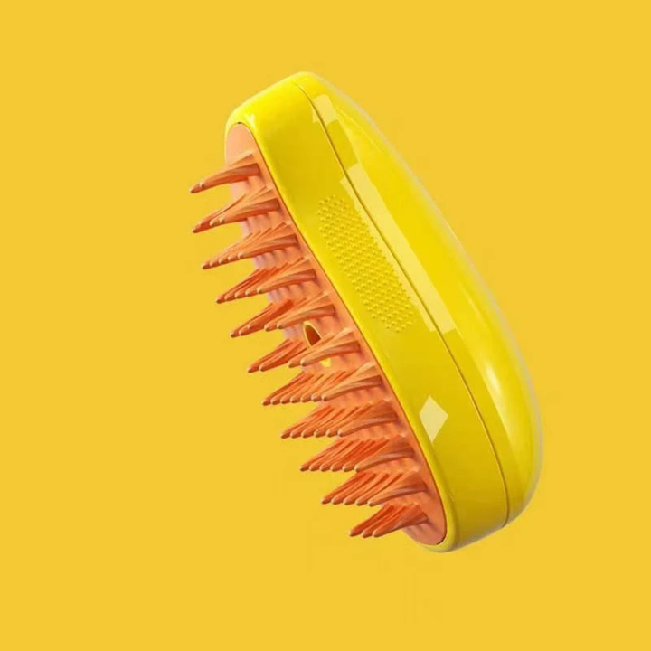 Pet steam brush for dog & cat grooming, deshedding, with comfortable handle for effective pet care.