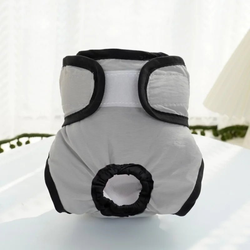 Folded reusable pet diaper, highlighting its absorbent layers for female dog incontinence