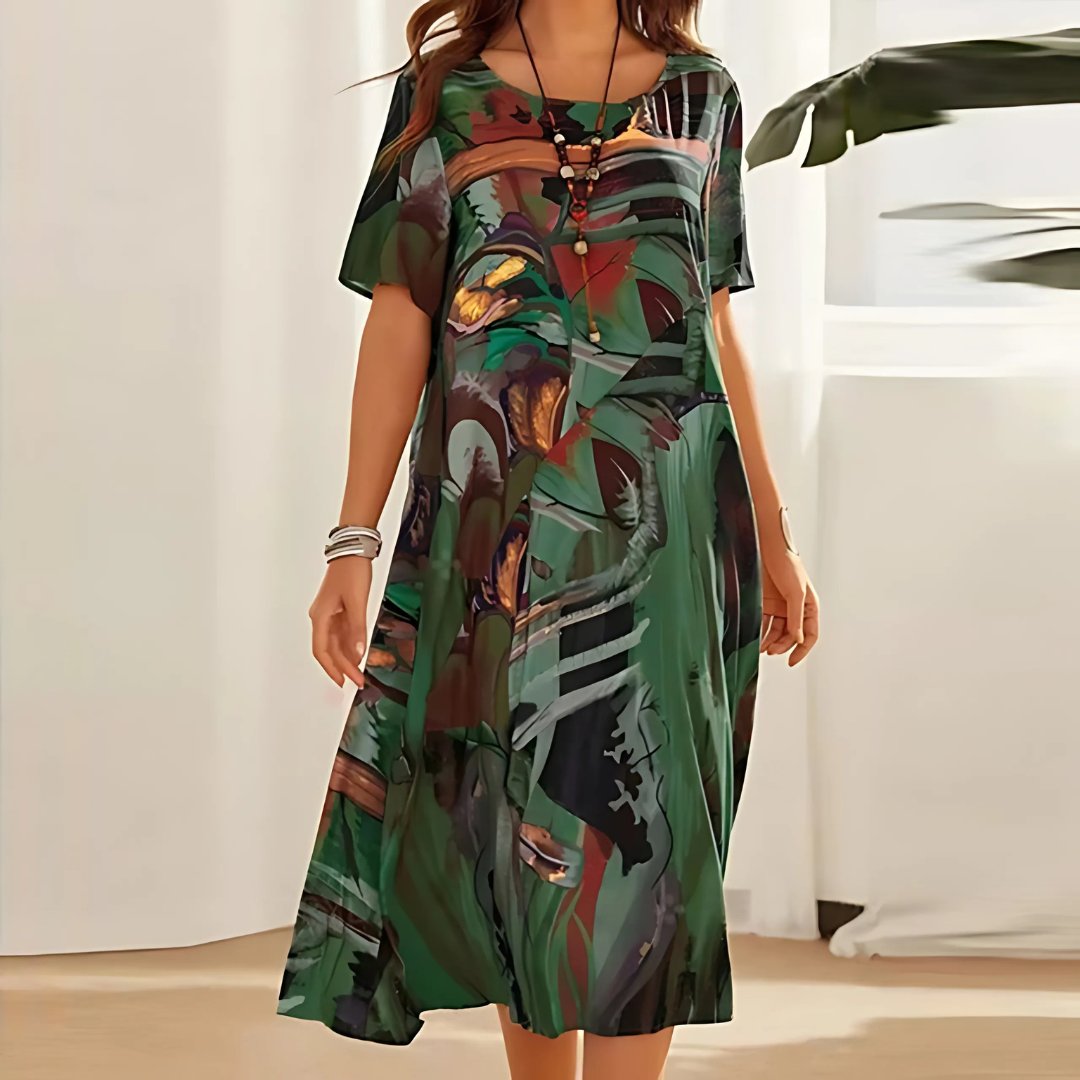 Flowy plus size women's abstract print maxi dress with short sleeves, perfect comfortable everyday casual wear.