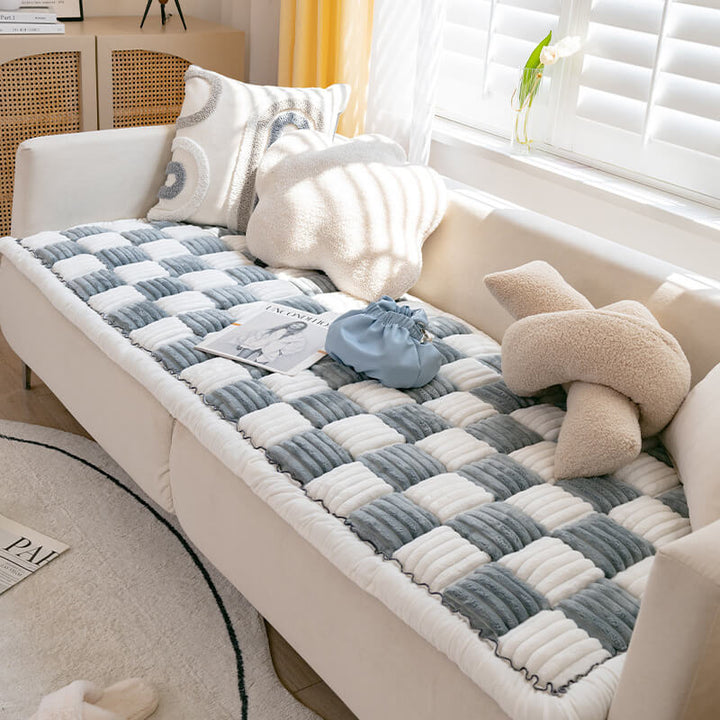 Soft, yet sturdy, chenille sofa cover protecting against spills and pet wear.