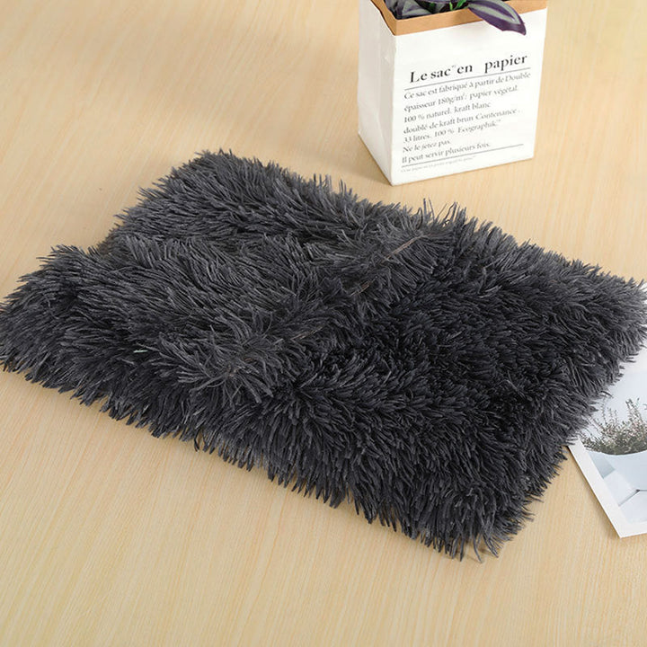 Soft pet bedding: gray plush dog & cat blanket, excellent for travel