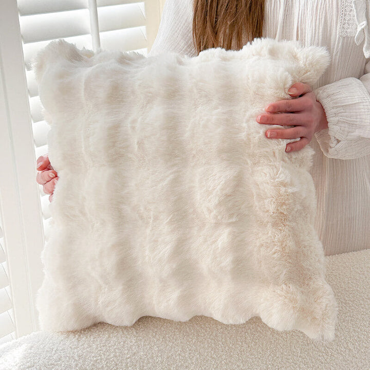 Pet-friendly faux rabbit fur couch cover, ideal for protecting furniture while maintaining a chic aesthetic.