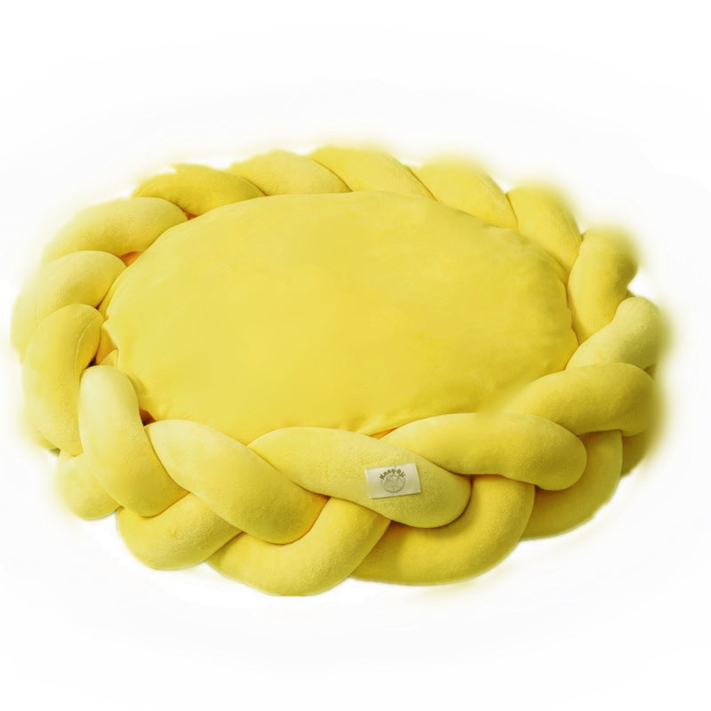Plush luxury dog bed with braided edges, perfect for ultimate pet comfort and support.