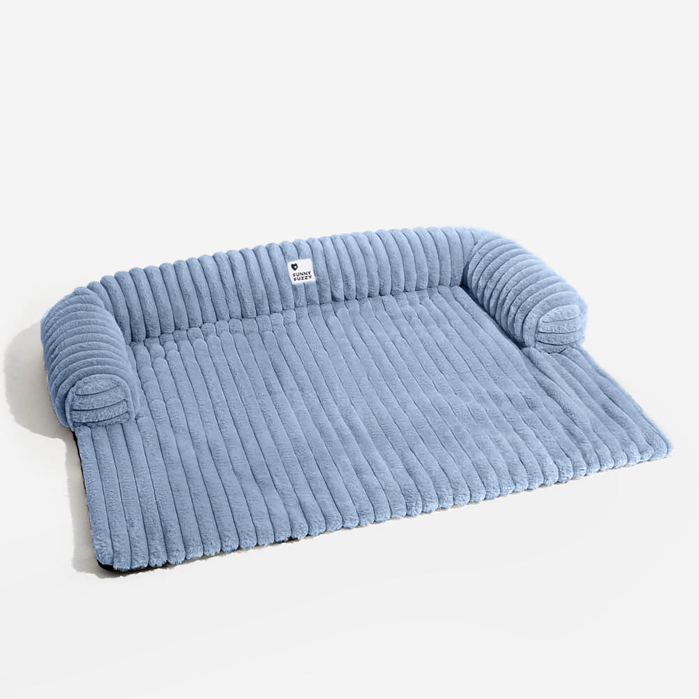 Gray plush pet couch cover with bolster, non-slip design, protects sofa from dog hair and dirt, washable.